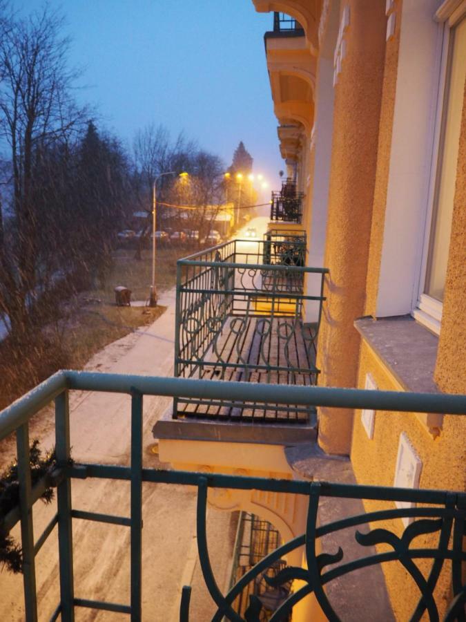 Apartment Balconies Above Colonnade *